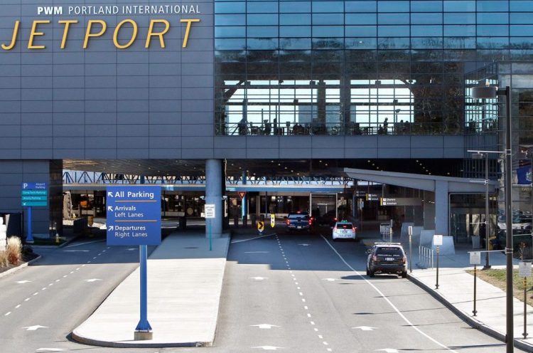 The city settled a lawsuit with two former workers at the Portland International Jetport who alleged they were the targets of age discrimination.