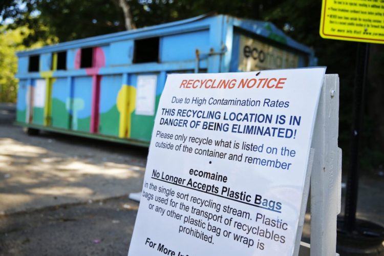 A sign posted by ecomaine in Yarmouth last summer warns residents about the high contamination rates in the town's recycling, suggesting that this dropoff location could be in jeopardy of being eliminated.