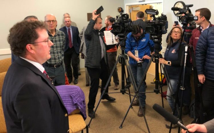 Mark Vannoy, former chairman of the Public Utilities Commission, speaks with reporters in April after the commission voted to grant a crucial certificate for Central Maine Power’s proposed 145-mile transmission line from Quebec to Lewiston.