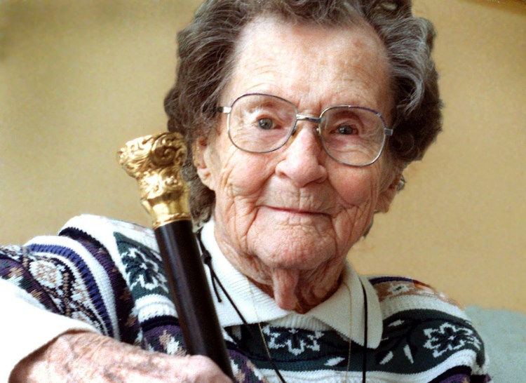 Edna Haley, 97, of Bowdoinham with her Boston Post Cane in 2001. The cane is given to a town's oldest resident.