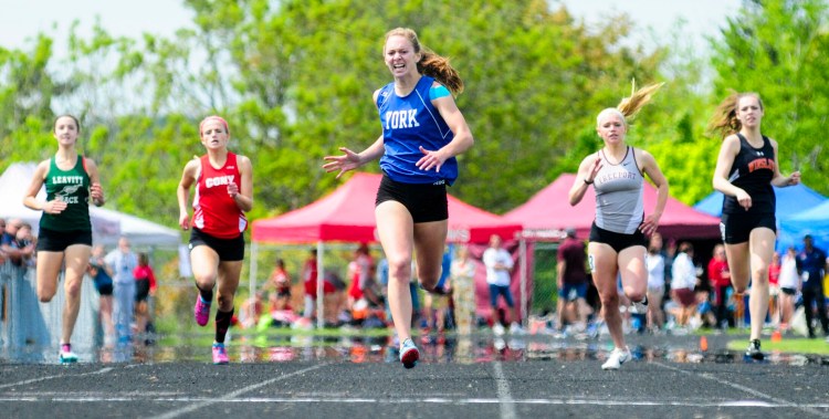 York's Erin O'Donnell wins 400 meters at the Class B track and field state championship meet Saturday in Brewer. O'Donnell finished in 1:00.29.