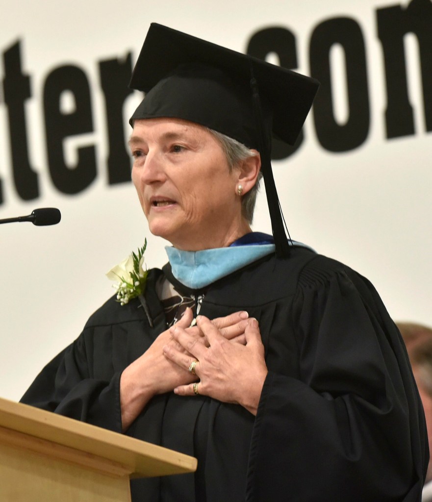 Long time Maine Central Institute teacher Tanya Kingsbury gives a commencement address  Sunday to the graduating class during the school's 150th commencement in Pittsfield.