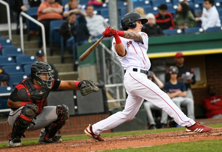 Jarren Duran of the Sea Dogs connects for a base hit against the Richmond Flying Squirrels Tuesday night at Hadlock Field.