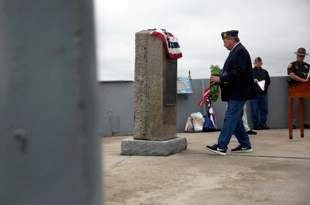 PORTLAND, ME - JUNE 6: Joe Rich, an Army veteran from the Vietnam era (cq not a combat/war veteran), prepares to lay a wreath at Ft. Allen Park on Thursday -- the 75th anniversary of the American-led invasion of Normandy, France -- to commemorate the 83 Mainers known to have died during D-Day and are buried near the battlefield at Omaha Beach. Rich's uncle died during World War II, he said. (Staff photo by Ben McCanna/Staff Photographer)