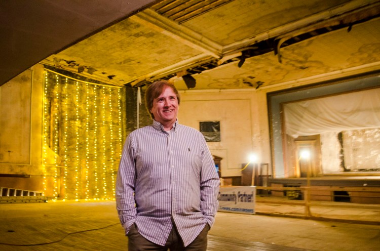 Peter Bezemes, the new executive director of the Colonial Theater in Augusta, stands in the theater Wednesday. 
