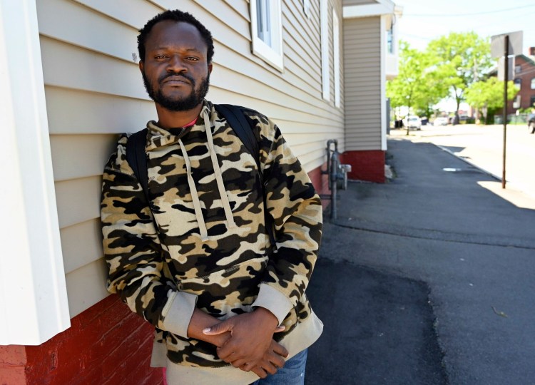 Joel Nduluyele, an asylum seeker from the Democratic Republic of the Congo, arrived in Portland on Sunday. "I suffered a lot to make it here,” he said Wednesday outside Portland’s Bayside Family Shelter. “A lot. A lot.”