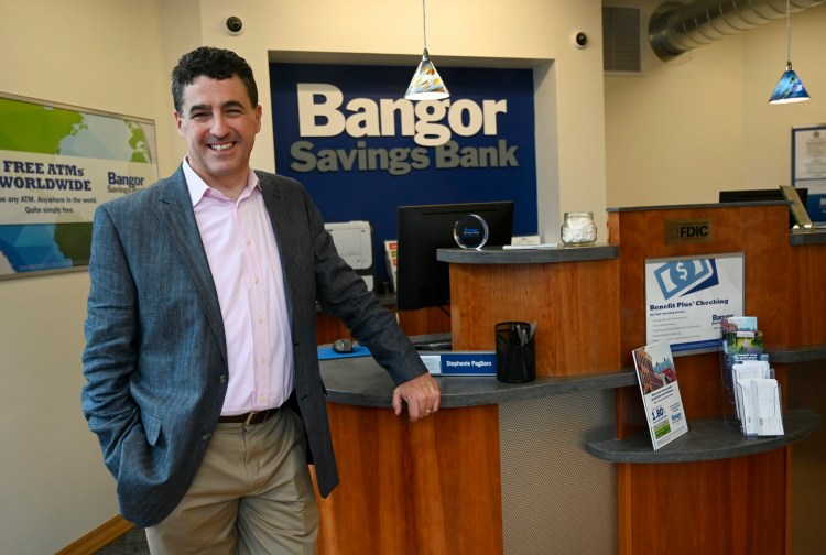 Bangor Savings President and CEO Bob Montgomery-Rice stands in the lobby of Bangor Savings' new Portsmouth, New Hampshire, location. Maine banks are expanding into New Hampshire for more business opportunities. 
