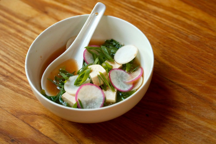 Ginger-Garlic Miso Soup uses both radish (or turnip) greens and roots. 
