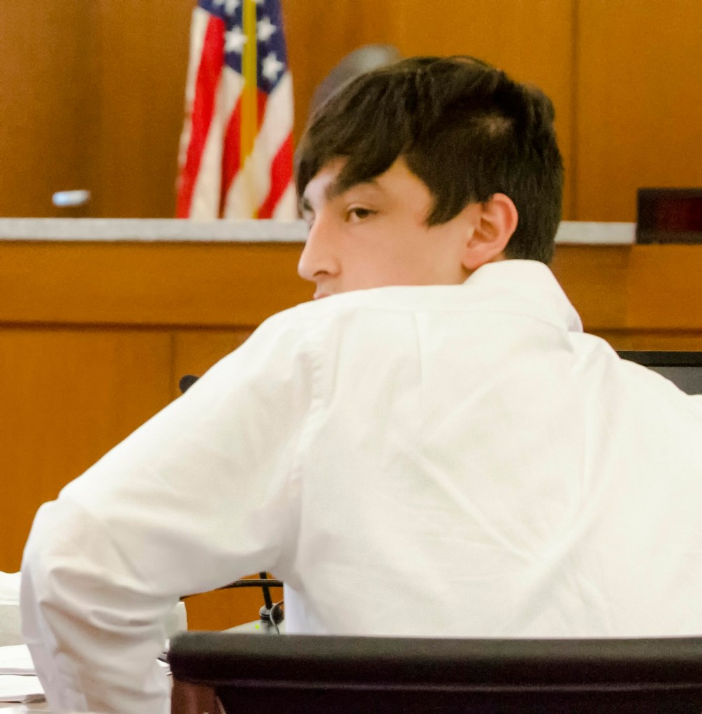William Smith, one of three teens charged in the April 2018 death of Kimberly Mironovas, looks to back of the court room where his father and family members were watching the hearing to determine whether or not to charge him as an adult on Wednesday at the Capital Judicial Center in Augusta.