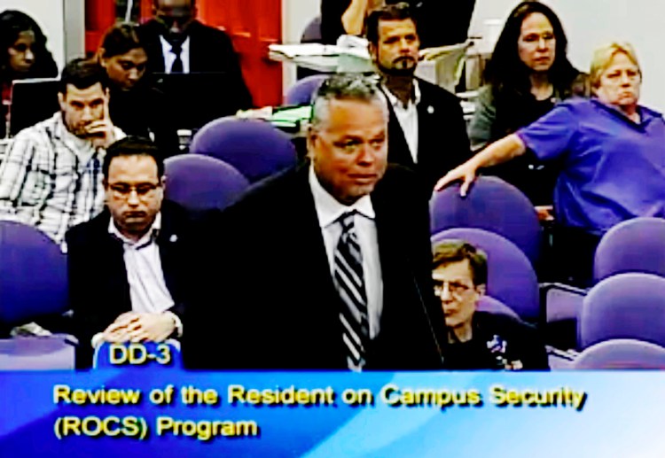  In this Feb. 18, 2015, file frame from video from Broward County Public Schools, school resource officer Scot Peterson talks during a school board meeting of Broward County, Fla. Peterson, the then-Florida sheriff's deputy assigned to protect the high school where 17 died in a 2018 shooting has been arrested on 11 charges, Tuesday, June 4, 2019. 