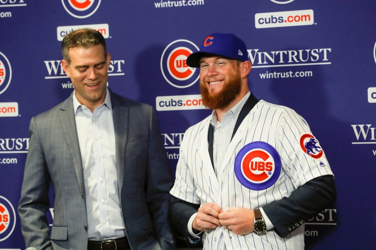 Chicago Cubs President Theo Epstein, left, introduces pitcher Craig Kimbrel during a news conference at Wrigley Field on Friday.