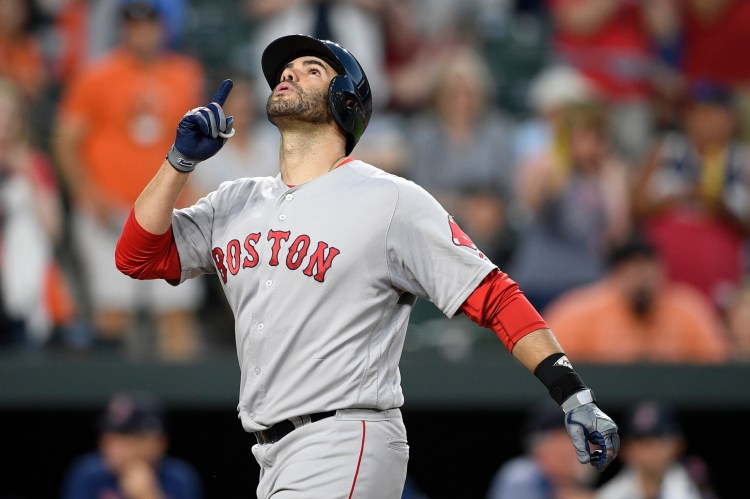 J.D. Martinez of the Red Sox celebrates his two-run home run in the fourth inning Friday night at Baltimore. Martinez hit two homers in the game.