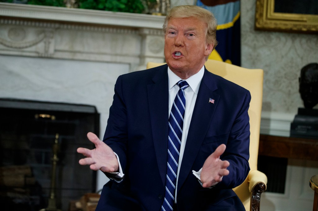 President Trump speaks during a meeting with Canadian Prime Minister Justin Trudeau in the Oval Office of the White House on Thursday. Trump declared that "Iran made a very big mistake" in shooting down a U.S. drone but suggested it was an accident rather than a strategic error.