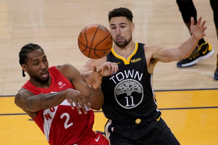 Kawhi Leonard, left, and the Toronto Raptors are a win away from winning the NBA title. They have a 3-2 lead over the Klay Thompson and the Golden State Warriors heading into Game 6, which is Monday in Toronto.