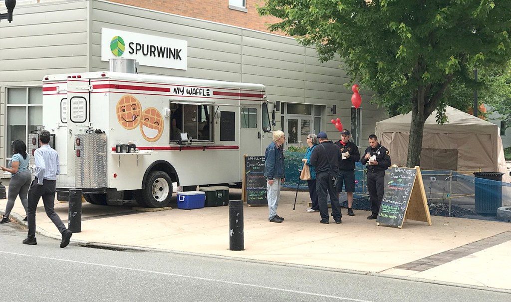 Food truck are set up Friday on Lisbon Street in Lewiston. The trucks are part of a block party for the Trek Across Maine.