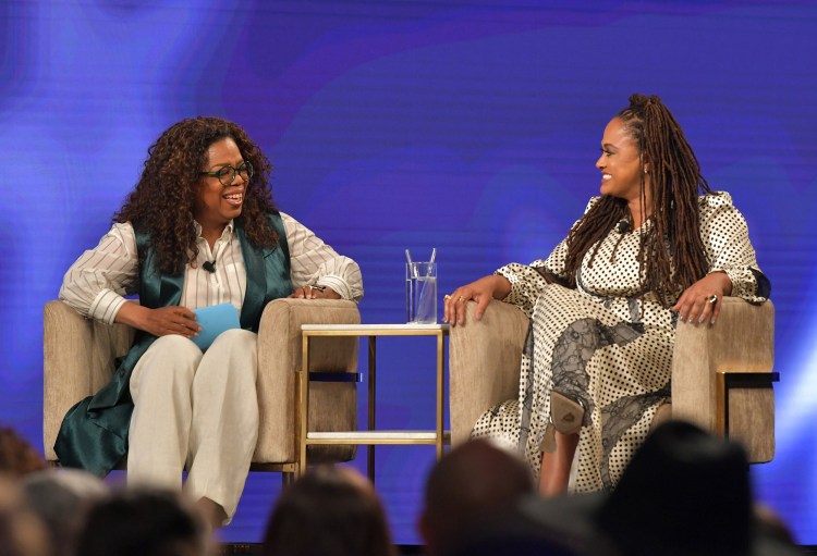 Oprah Winfrey and Ava DuVernay speak onstage at the Netflix screening of "When They See Us." 
