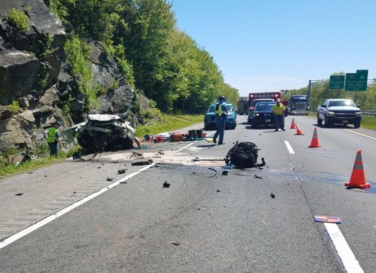 Police say this car crashed into the stone ledge along the northbound lanes of Interstate 295 in Falmouth and the impact ripped the engine from the vehicle's frame. 
