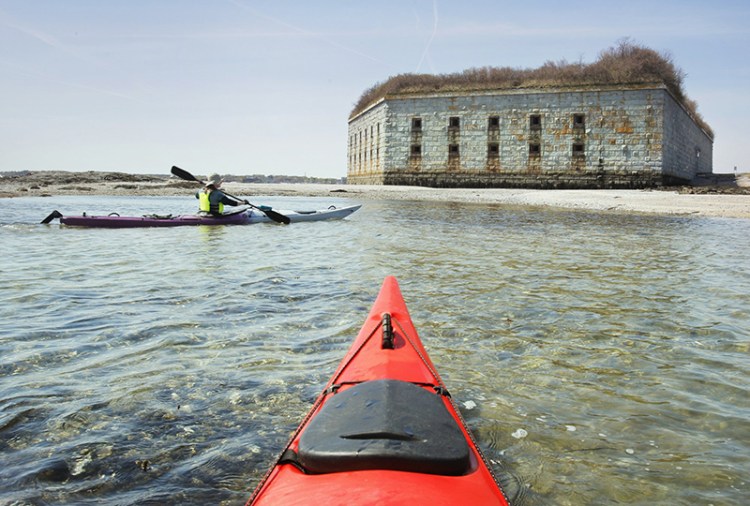 Paddling to a beach during low tide at Fort Gorges in Casco Bay.