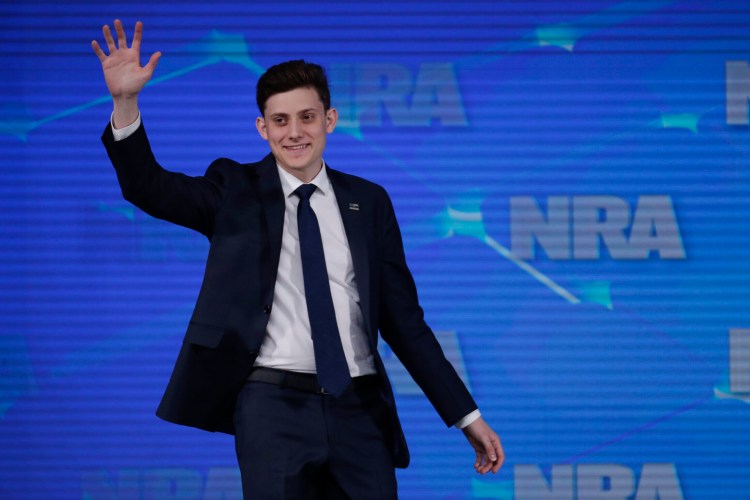 Kyle Kashuv, a survivor of the Marjory Stoneman Douglas High School shooting in Parkland, Fla., speaks at the National Rifle Association Institute for Legislative Action Leadership Forum in Indianapolis on April 26. Michael Conroy/Associated Press