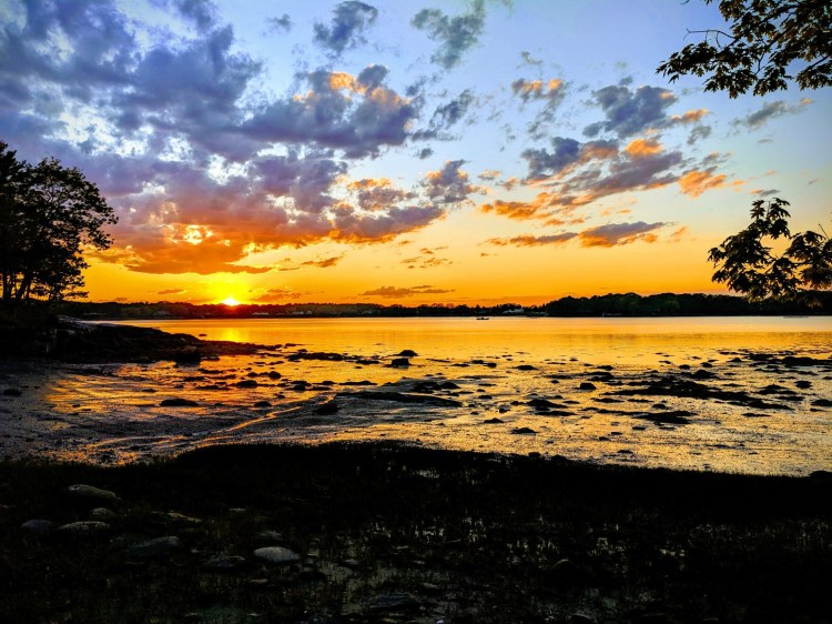 Sunset at Littlejohn Island Preserve. Maine is best known for it sunsets, but you can't argue with this. Photo by Josh Christie. 