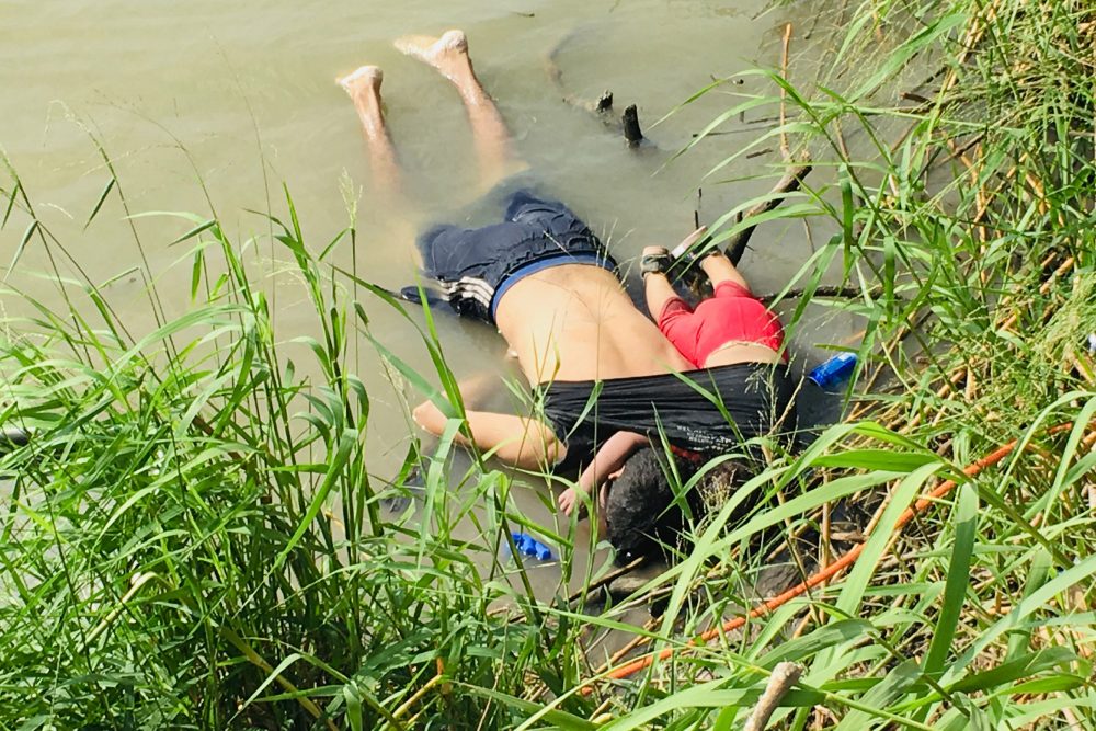 The bodies of Salvadoran migrant Oscar Alberto Martínez Ramírez and his nearly 2-year-old daughter Valeria lie on the bank of the Rio Grande in Matamoros, Mexico after they drowned trying to cross the river to Brownsville, Texas. 