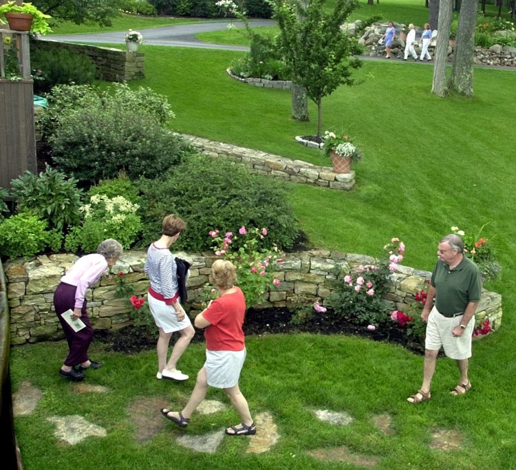 Garden enthusiasts on a past garden tour in East Winthrop.