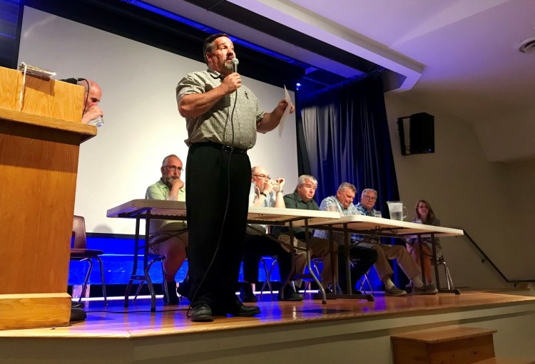 Madison Town Manager Tim Curtis, seen addressing residents at the June 2019 Town Meeting, said this week that it will cost about $2,500 to hold a special recall election set for March 7. More than 200 people signed a petition in an effort to recall Selectman Glen Mantor, who has taken issue with how a code enforcement officer position was filled in town.