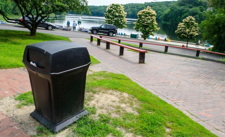 This photo, taken Tuesday, shows a trash can above Granite City Park near the Harlow Gallery on corner of Winthrop and Water streets in Hallowell. There isn't one closer to the Kennebec River down by the bulkhead.