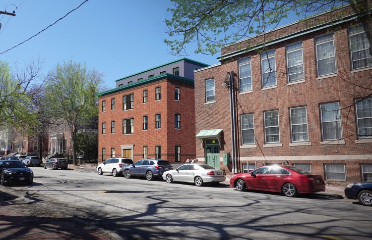 Developers Collaborative is proposing to build a new four-story 30-unit affordable housing building behind 66 State St.