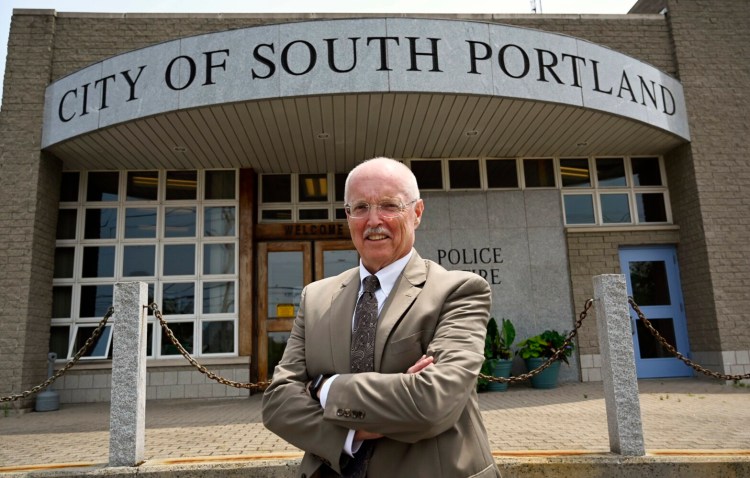 Police Chief Edward Googins stands in front of the South Portland station on Wednesday.