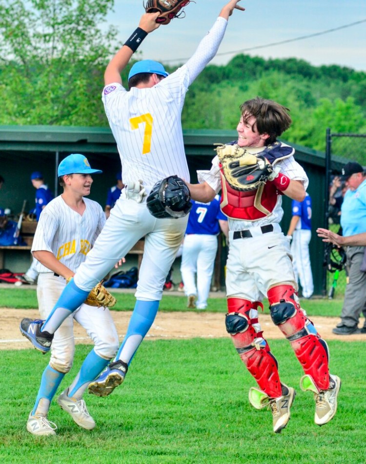 Somerset pitcher/shortstop Mitchell Grant, left, and catcher Joe Ardito celebrate during a 13-15 Babe Ruth state tournament game against Capital Area in Augusta. 