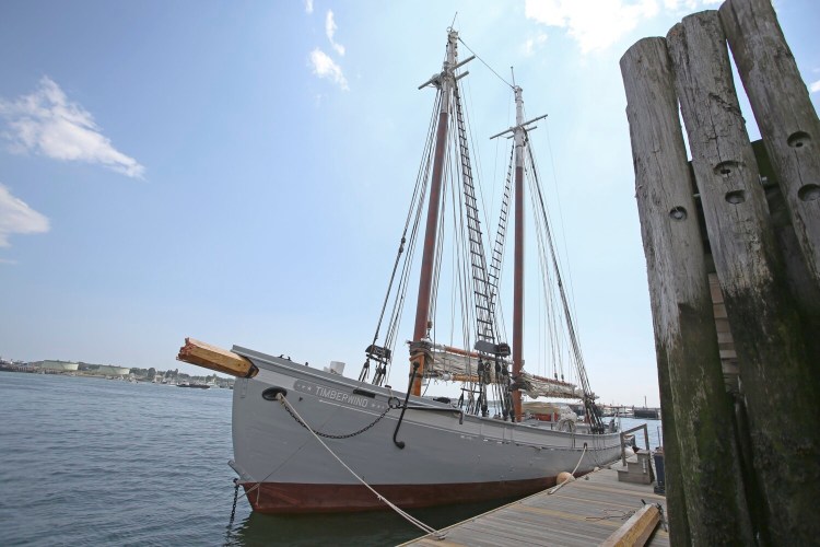 The schooner Timberwind is moored at a pier in Portland on Monday after a collision between the sailing vessel and a lobster boat a day earlier. The broken bowsprit has been replaced.