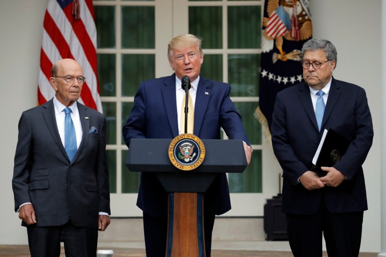 President Trump is joined by Commerce Secretary Wilbur Ross and Attorney General William Barr, right, as he speaks at the White House on Thursday.