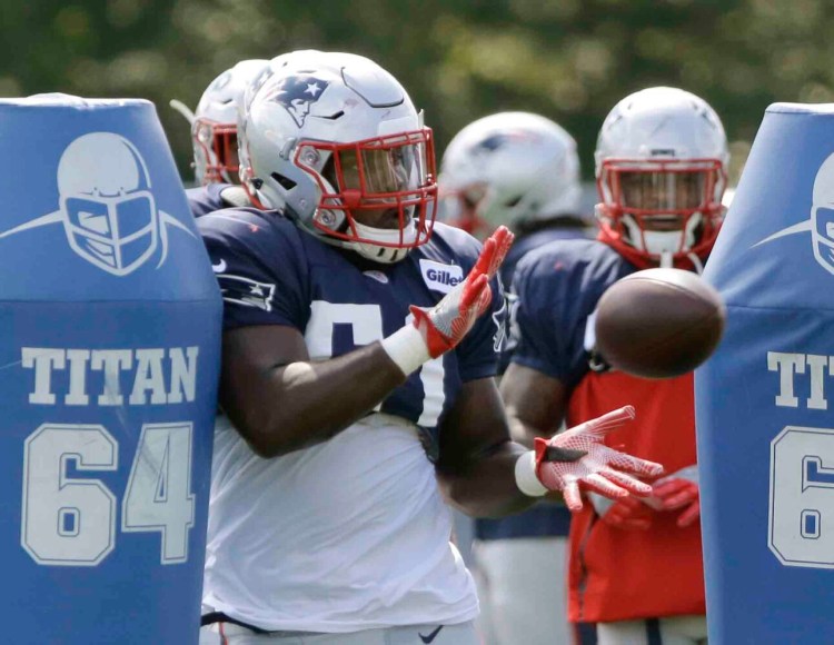 New England linebacker Ja'Whaun Bentley is back at practice for the Patriots after a biceps injury cut his rookie season short. 