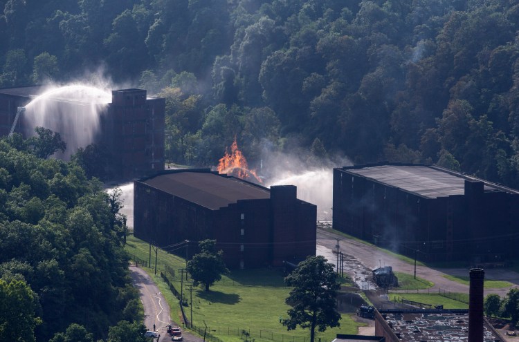 Flames and smoke rise from a  bourbon warehouse fire at a Jim Beam distillery in Woodford County, Ky., on July 3.