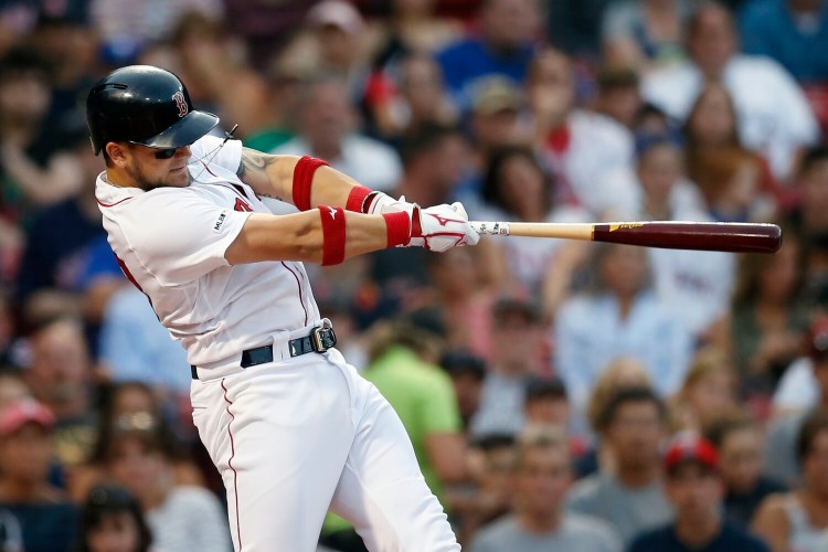 Michael Chavis hit a grand slam in the first inning and the Boston Red Sox held on to beat the Toronto Blue Jays 10-8 on Monday in Boston.