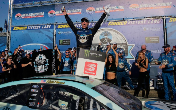Kevin Harvick celebrates in victory lane after winning a NASCAR Cup Series race on Sunday at New Hampshire Motor Speedway in Loudon, N.H.