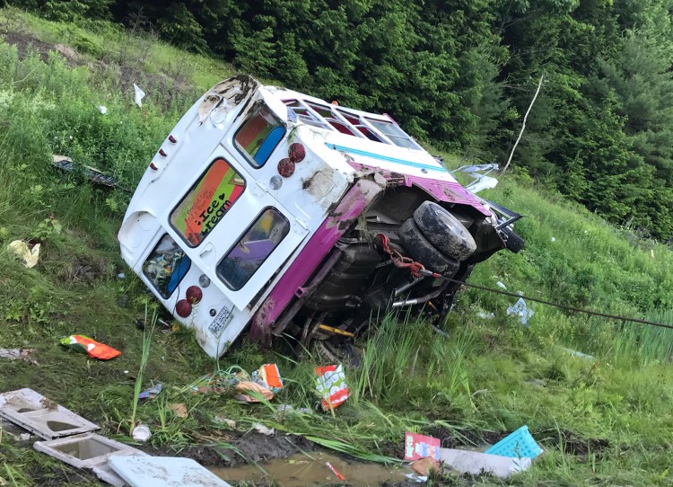 Sagadahoc County Sheriff Joel Merry said this bus collided with another vehicle and landed on its side on Interstate 295 in Bowdoinham on Monday.