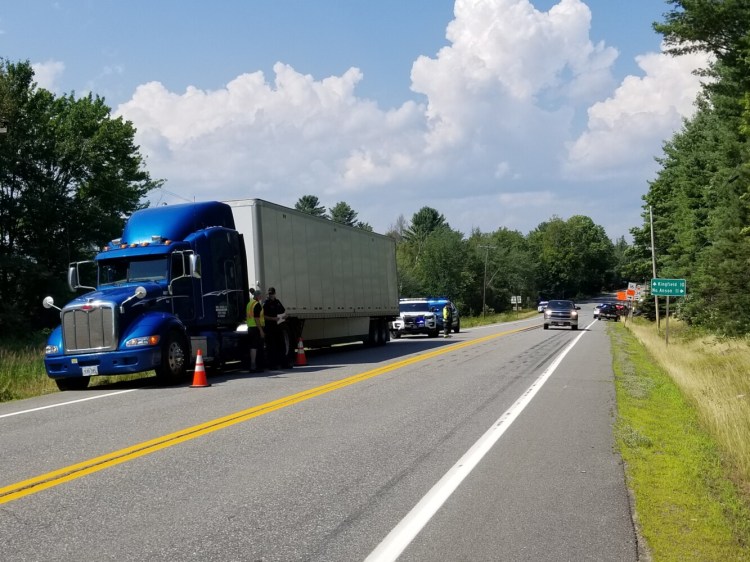 A tractor-trailer loaded with bottled water was heading south on Route 27 in New Vineyard and was struck by a vehicle coming off Anson Valley Road.
