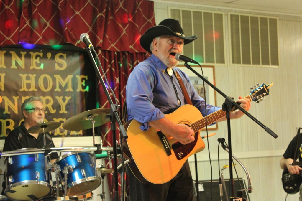 Bob Heller, center, host of "Maine's Down Home Country Jamboree," performs a traditional country song during a taping of the new Fox 22 show Sunday night at 21 College Ave. in Waterville. 