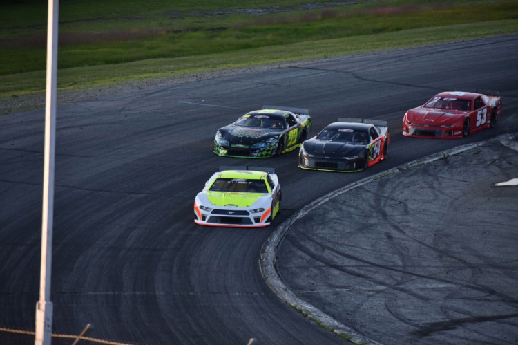 Ben Rowe leads the field during Sunday's PASS 150 at Oxford Plains Speedway in Oxford. Rowe finished second.