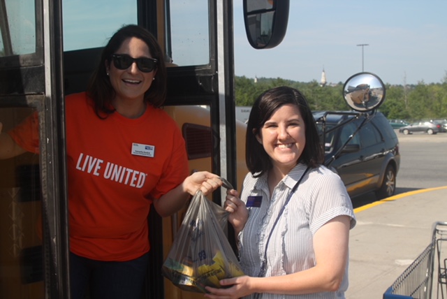 United Way of Mid-Maine Rising Leaders Samantha Burdick, left, and Elizabeth Llewellyn Stuff the Bus at last year's event.