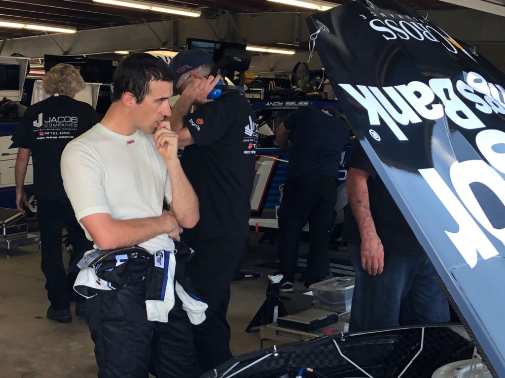 Austin Theriault looks over his No. 52 Bangor Savings Bank Chevrolet following final practice for the Foxwoods Resort Casino 301 on Saturday at New Hampshire Motor Speedway in Loudon, N.H.