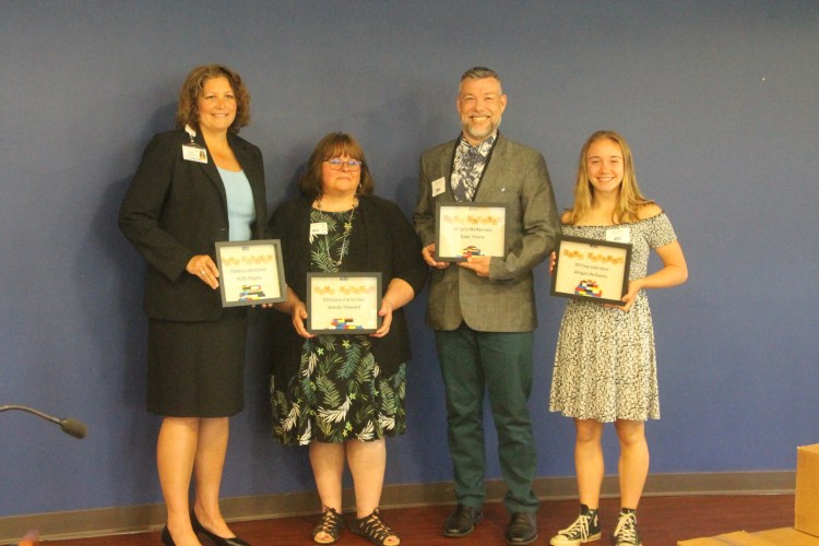 The United Way of Mid-Maine has announced its Community Impact Award recipients. From left are Buffy Higgins, Wanda Steward, Nate Towne and Abigail Williams.