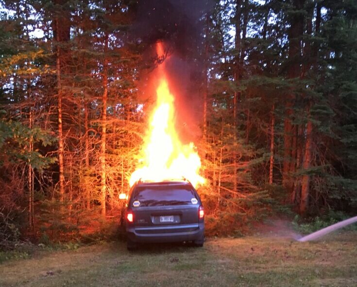 Skowhegan police investigated this van fire Tuesday on Malbon Mills Road in Skowhegan. Two people were arrested later in connection with the fire and theft of the van.