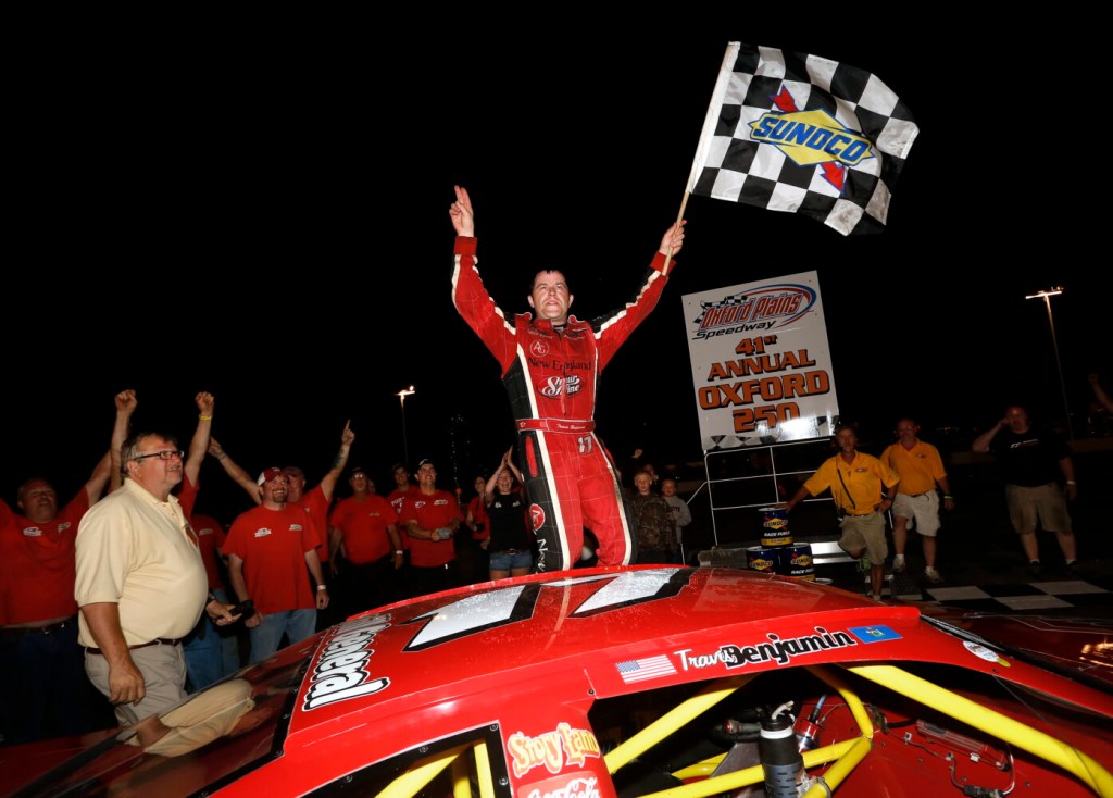 Travis Benjamin of Morrill celebrates after winning the Oxford 250 for the second consecutive year in 2014. 