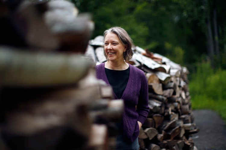 Lisa Hayden of Scarborough translates contemporary Russian novels into English. She stacks her firewood in a circle, an idea she got from one of the novels she translated. 