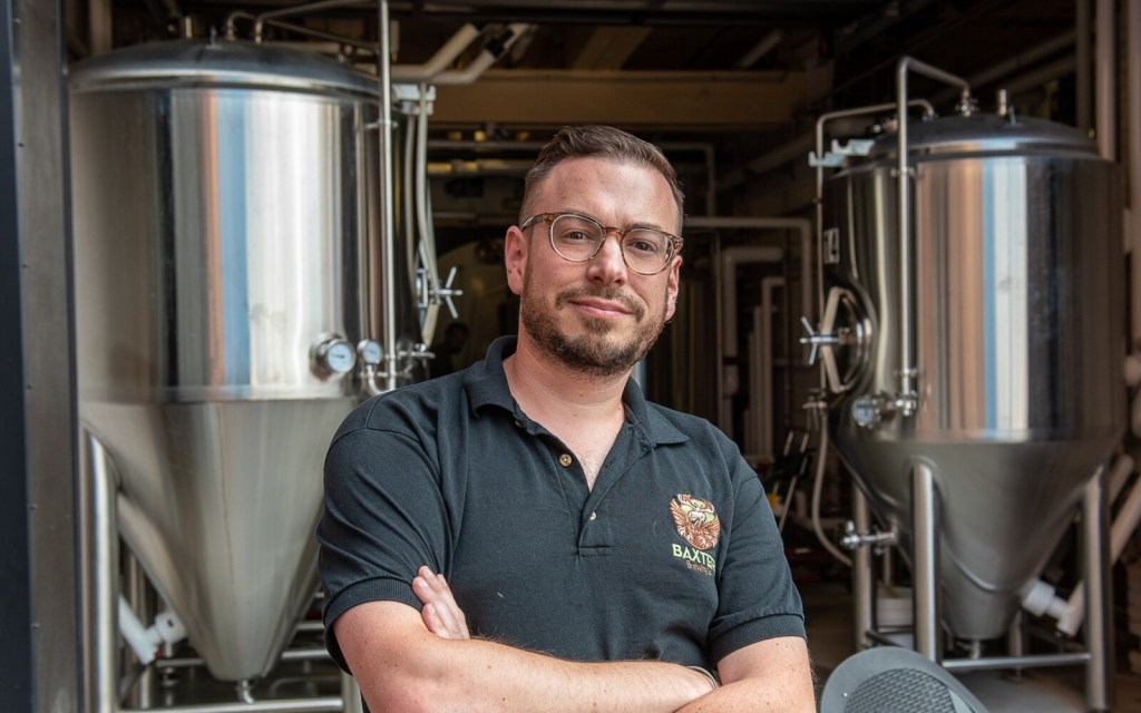 Baxter Brewing Co. founder Luke Livingston, at The Pub in Lewiston on Monday, announced that he's retiring from the company next month.