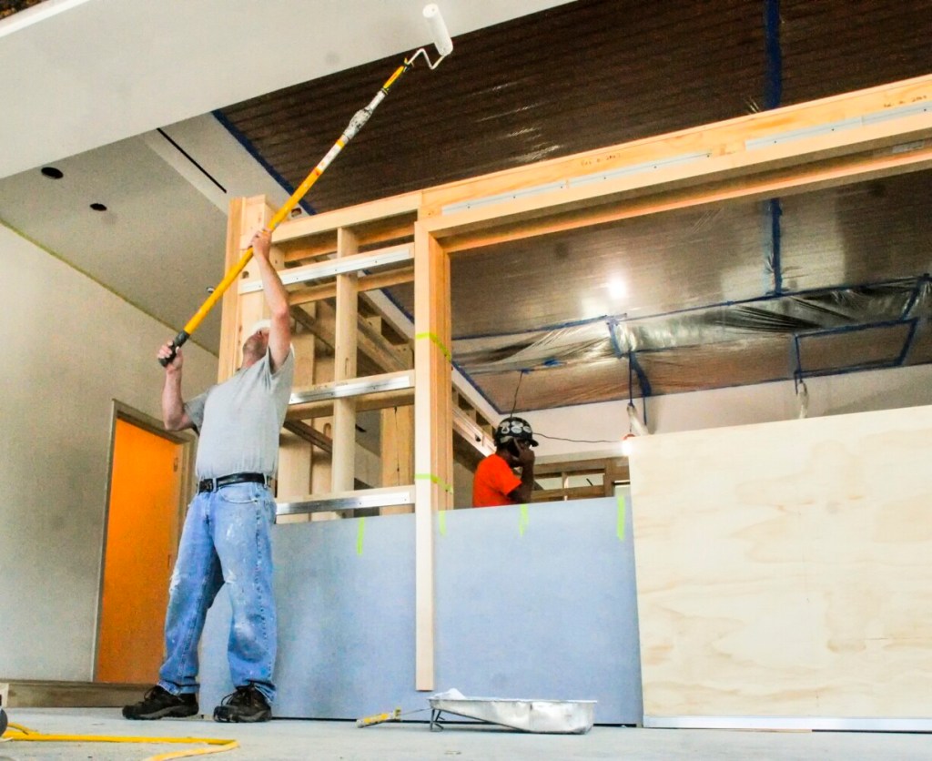 Richard Fortin, of Tierney Custom Painting and Coating, paints the lobby ceiling at the new MaineGeneral building being built by LaJoie Brothers Inc. on Friday on Brunswick Avenue in Gardiner.