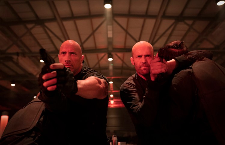 Dwayne Johnson, left, and Jason Statham star in  "Fast & Furious Presents: Hobbs & Shaw." 
